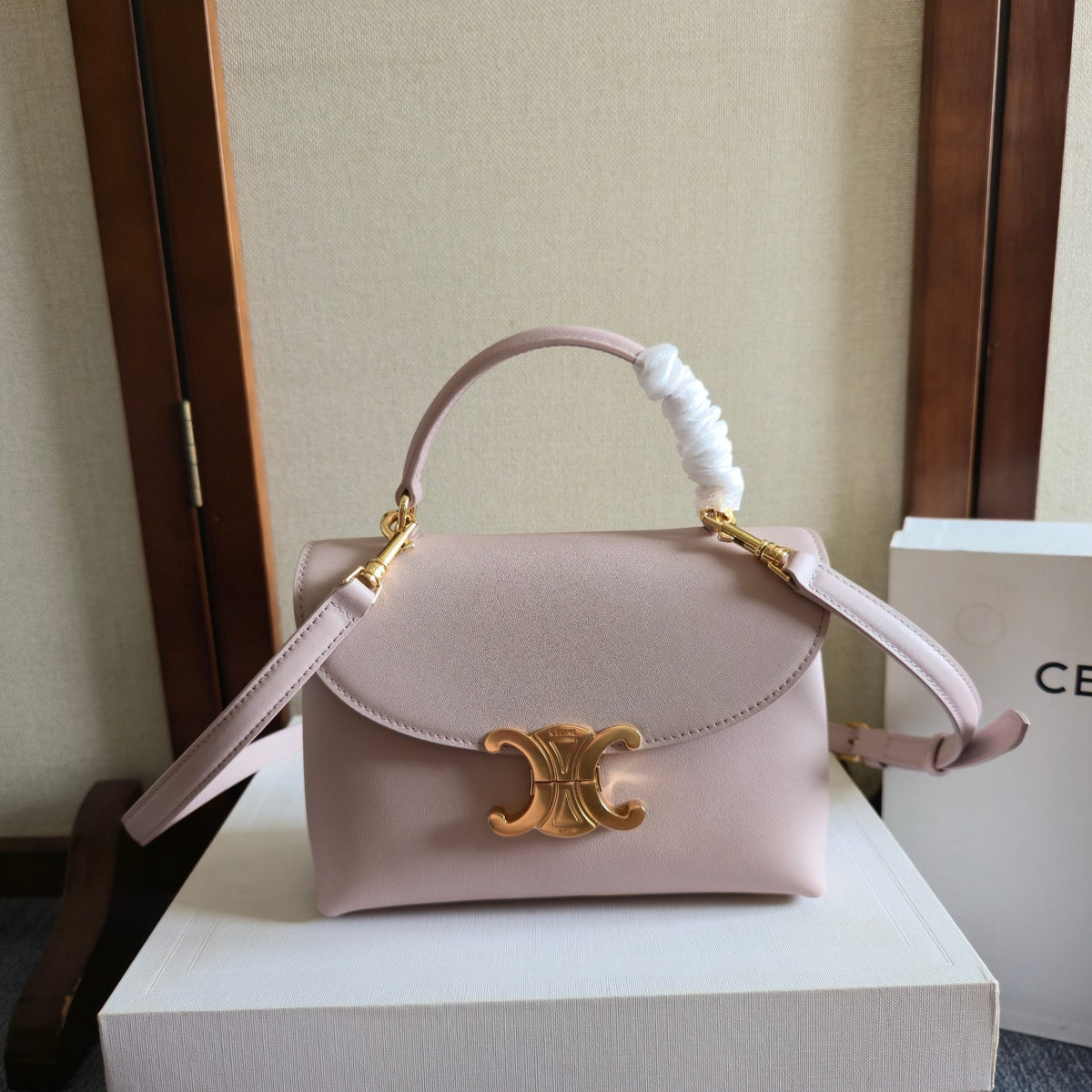 CELINE 25S NINO BAG 20MM IN LIGHT PINK GRAINED CALFSKIN GOLD HARDWARE