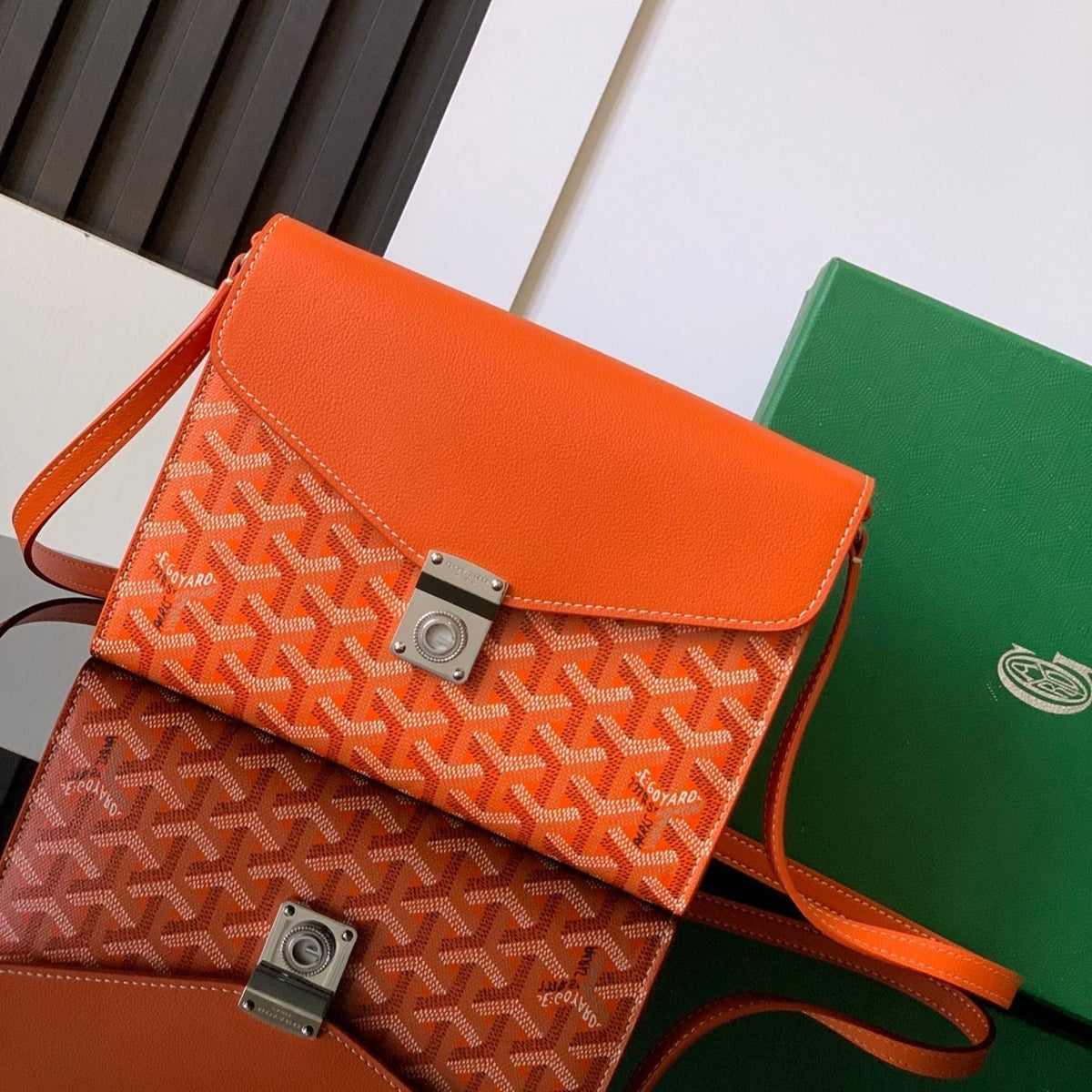 CHYPRE WALLET-POUCH 21 IN ORANGE GOYARDINE CANVAS AND CALFSKIN